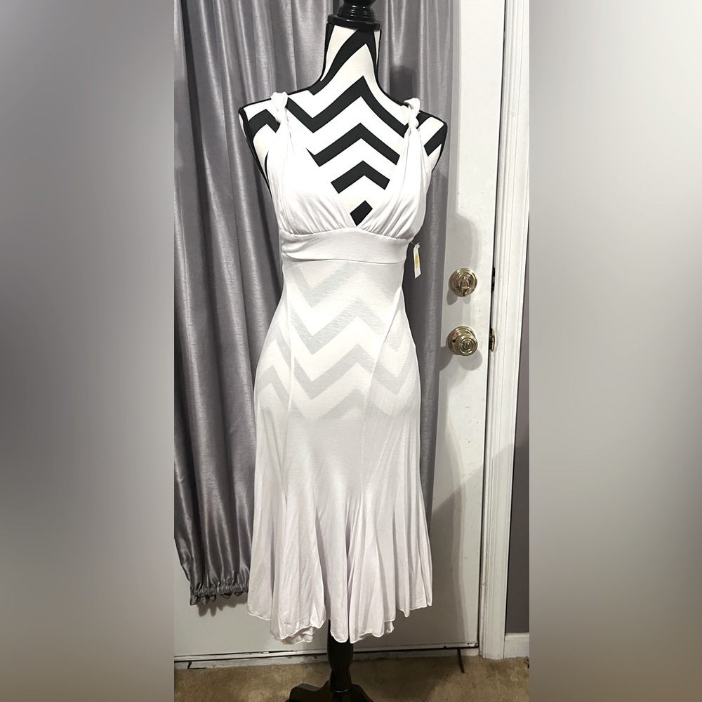 NWT, Women’s DZ white Dress, Small 
Flair bottom 
Strappy back